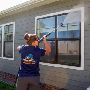 Advanced Window Cleaning female professional soft washing gray home